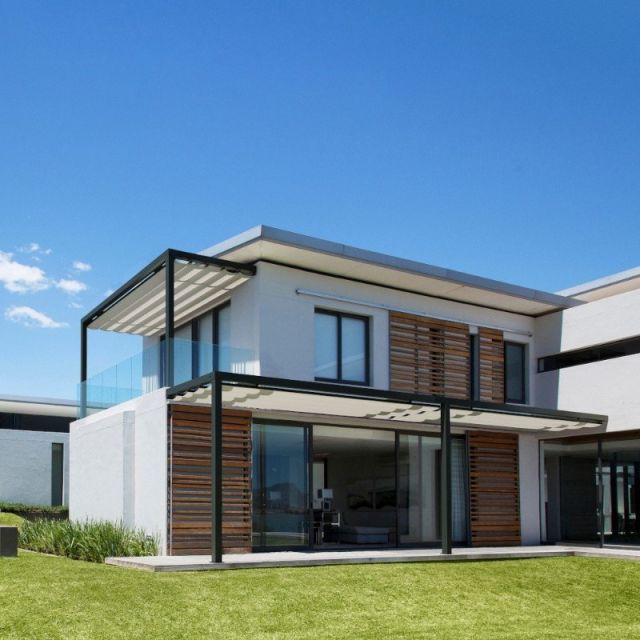 CLIMA ADOSSÉE - Pergola à toile MICROPERFORÉE rétractable